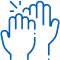 Multiple hands raised together in supportive gesture, symbolizing teamwork and community care.